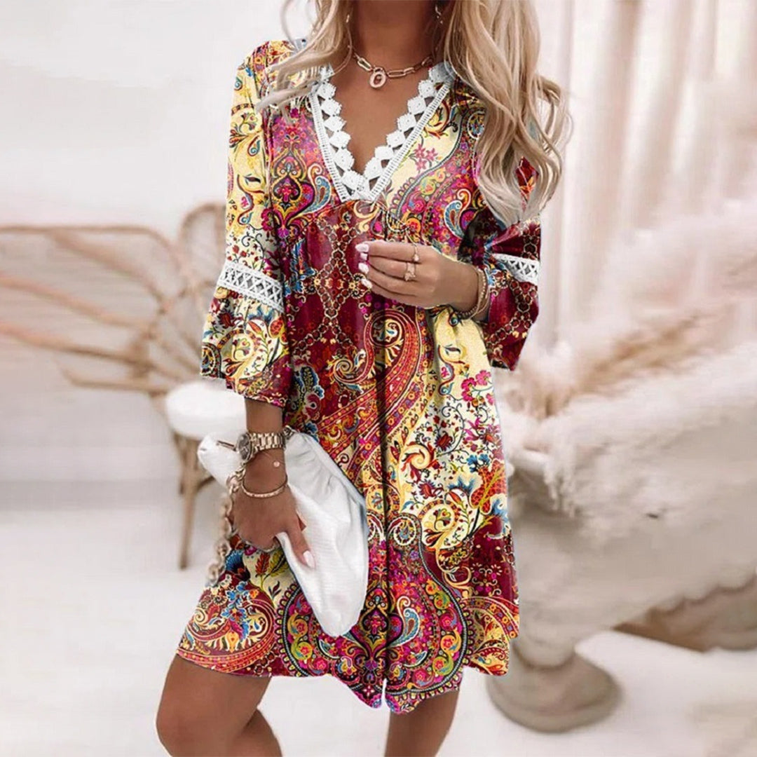 Luchtige zomerjurk met V-hals en elegante print – ideaal voor dames die houden van stijl en comfort