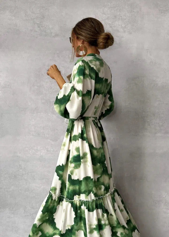 Lange damesjurk met V-hals, lange mouwen en elegante flowy pasvorm