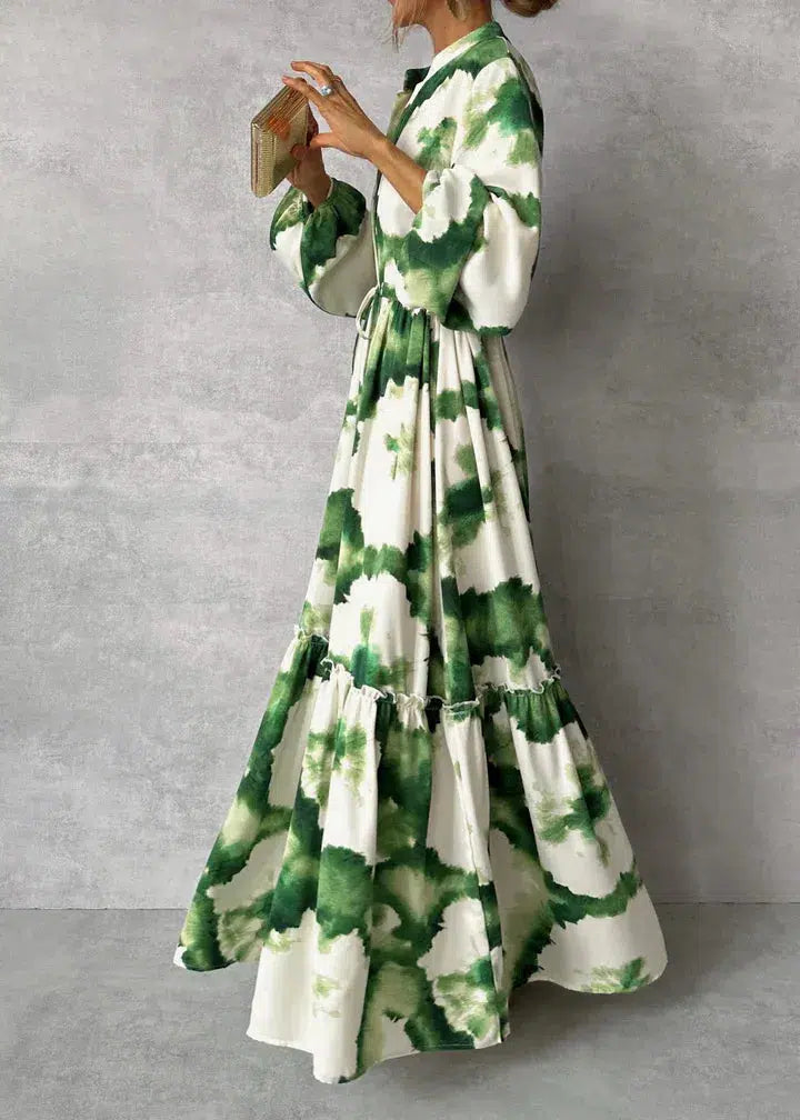 Lange damesjurk met V-hals, lange mouwen en elegante flowy pasvorm