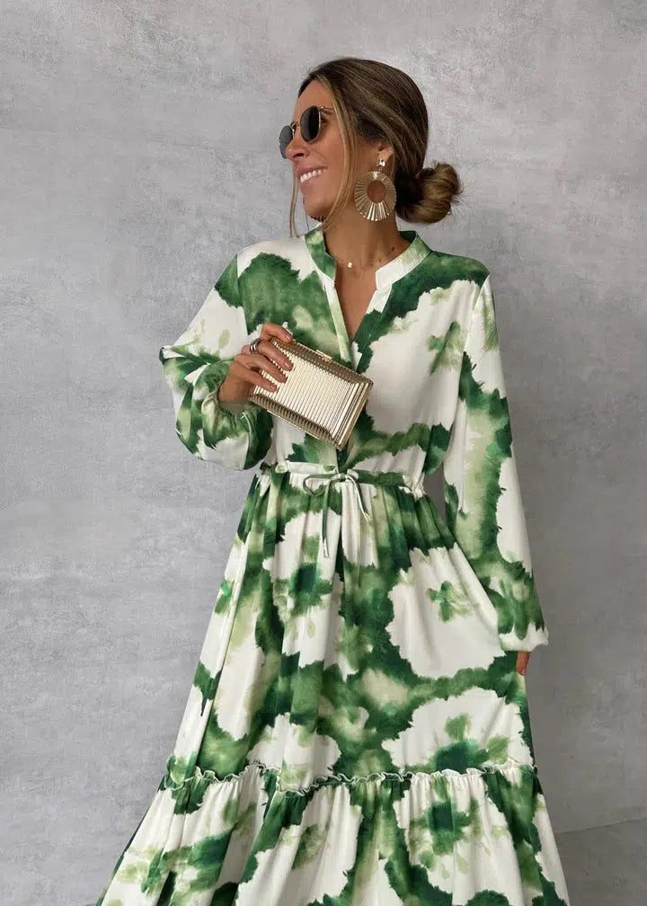 Lange damesjurk met V-hals, lange mouwen en elegante flowy pasvorm