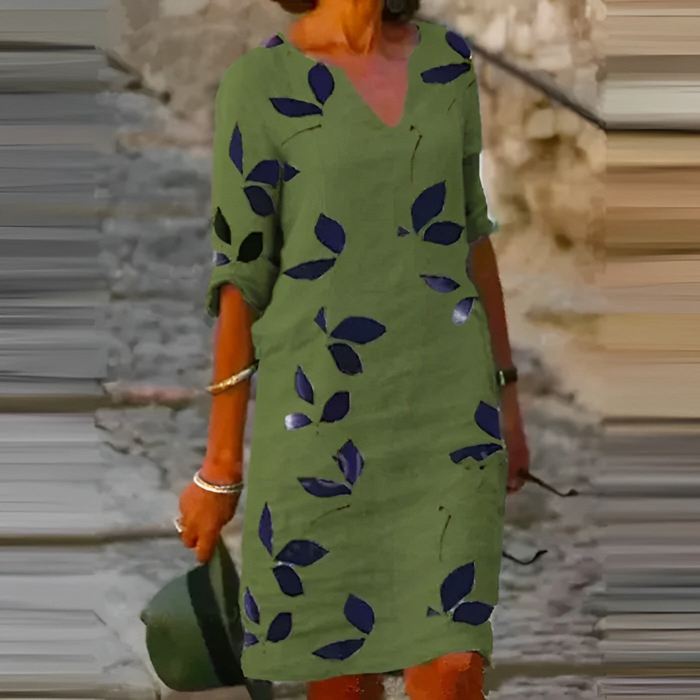 Zomerjurk met bladerenprint en V-hals – Luchtig, flatterend en vol flair